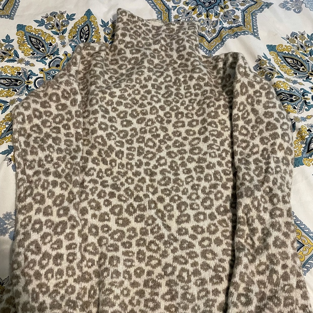 Women’s leopard print turtleneck sweater